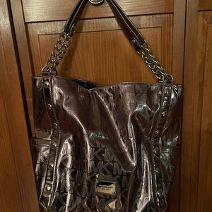 Michael Kors large shoulder bag.  Excellent condition.   Silver.